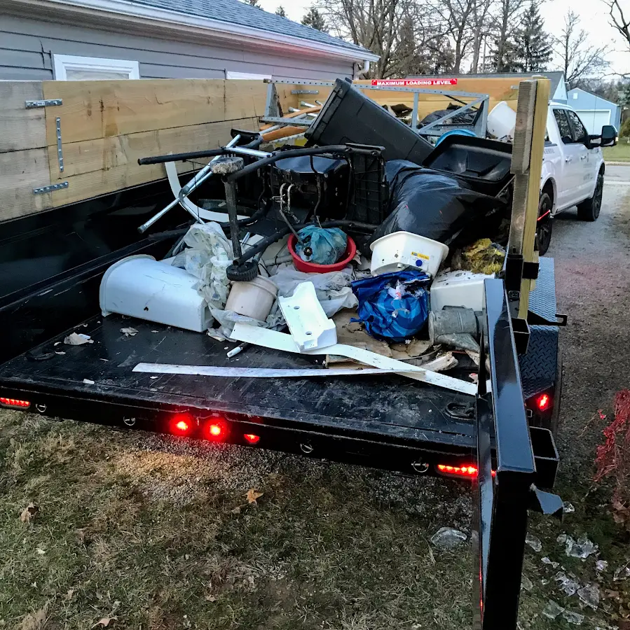 Roll-off dumpster delivered to a residential driveway in Webster City
